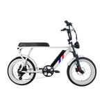 Electric E-Bike by Culture Ebikes in White with a red and blue stripe on the down-bar. Whitewall 20 inch by 4 inch puncture-resistant fat tires.